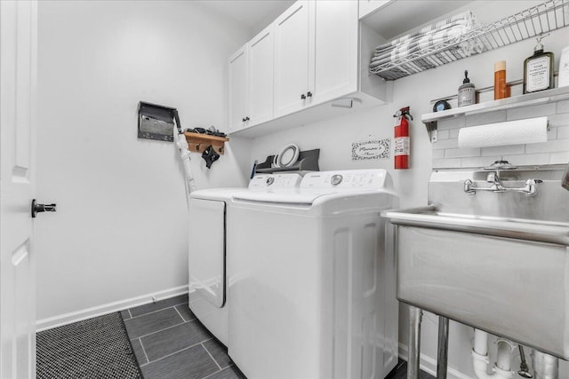 555 Pointe Of Oaks Rd, Summerville, SC 29485 - laundry area featuring cabinet space, independent washer and dryer, and baseboards