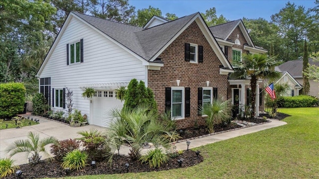 555 Pointe Of Oaks Rd, Summerville, SC 29485 - view of front of home with an attached garage, brick siding, a front lawn, roof with shingles, and concrete driveway