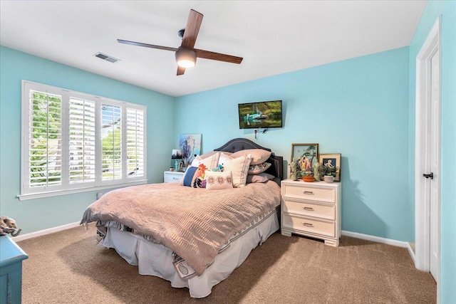 555 Pointe Of Oaks Rd, Summerville, SC 29485 - carpeted bedroom with baseboards and a ceiling fan