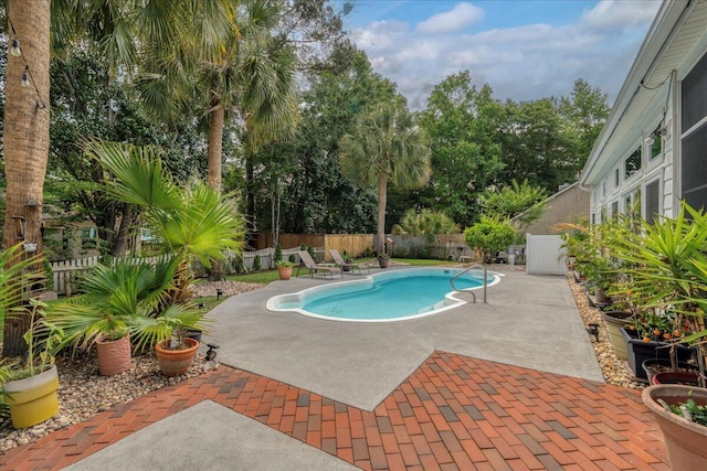 555 Pointe Of Oaks Rd, Summerville, SC 29485 - view of pool featuring a patio, a fenced backyard, and view of scattered trees
