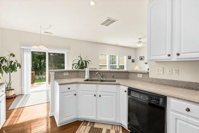 2132 Summerwood Dr, Mount Pleasant, SC 29466 - kitchen featuring black dishwasher, a sink, white cabinets, a peninsula, and ceiling fan