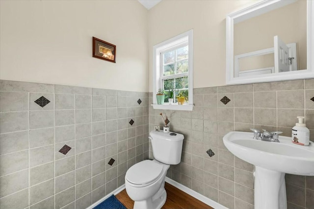 2132 Summerwood Dr, Mount Pleasant, SC 29466 - bathroom featuring tile walls, toilet, and wainscoting