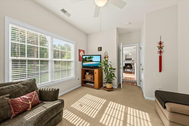 2132 Summerwood Dr, Mount Pleasant, SC 29466 - living area featuring a ceiling fan, baseboards, and light colored carpet