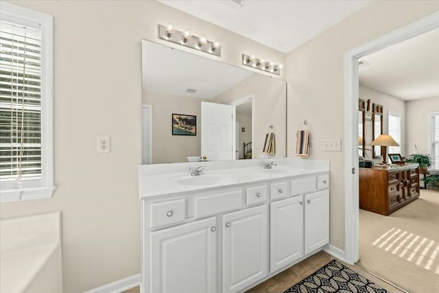 2132 Summerwood Dr, Mount Pleasant, SC 29466 - full bathroom with double vanity and baseboards