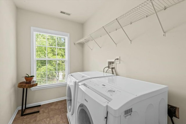 2132 Summerwood Dr, Mount Pleasant, SC 29466 - washroom with independent washer and dryer, baseboards, and stone finish floors