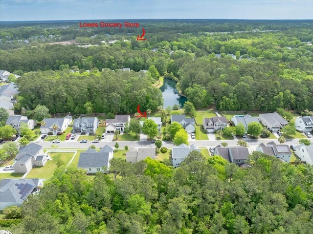 2132 Summerwood Dr, Mount Pleasant, SC 29466 - aerial perspective of suburban area featuring a heavily wooded area and a large body of water