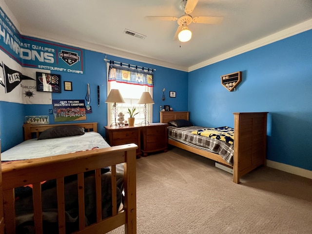 bedroom with carpet, visible vents, crown molding, a ceiling fan, and baseboards