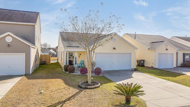 view of front of house with a garage, a front lawn, fence, and central air condition unit