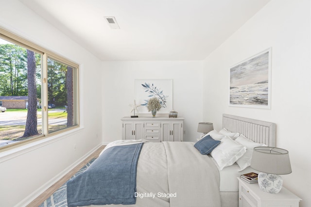 bedroom featuring wood-type flooring