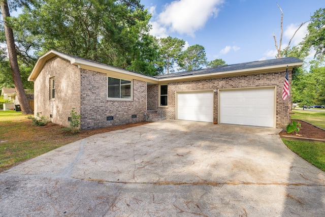 single story home with a garage