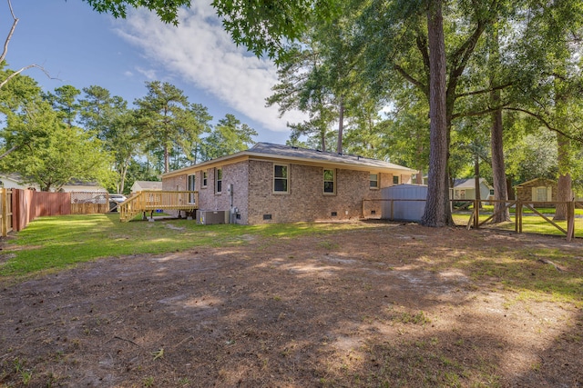 rear view of house with a deck