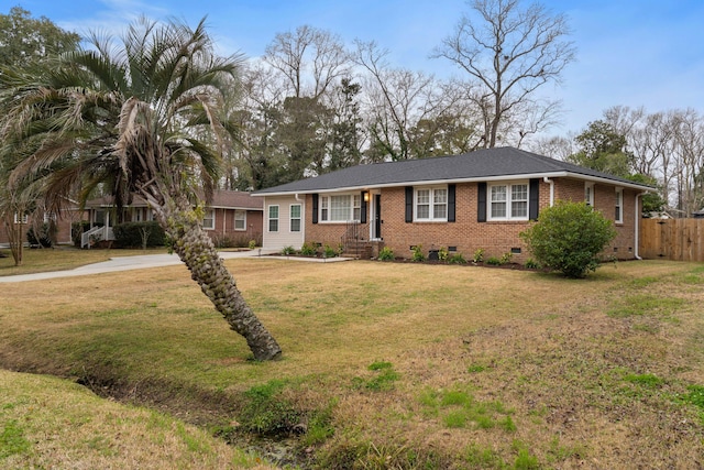 single story home featuring crawl space, brick siding, fence, and a front lawn