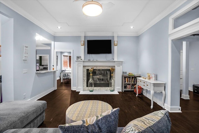 living room featuring ornamental molding and dark hardwood / wood-style floors