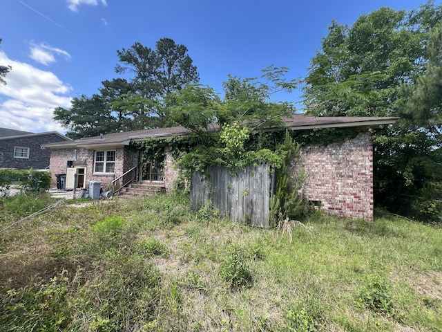 back of property with brick siding