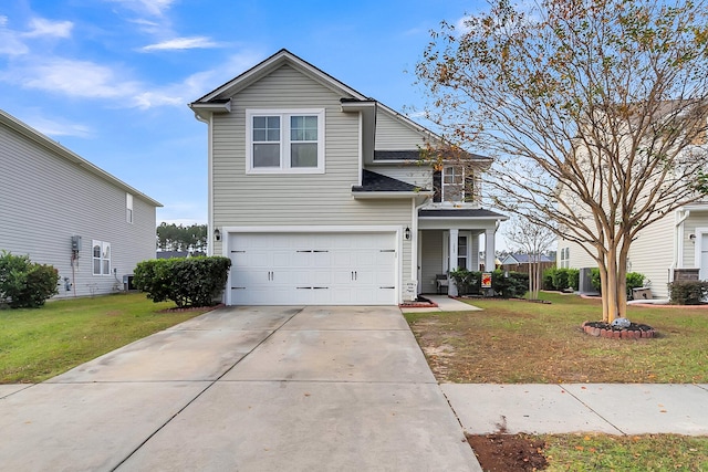 front facade with a front yard and a garage