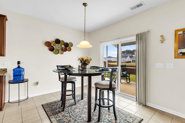 view of tiled dining space