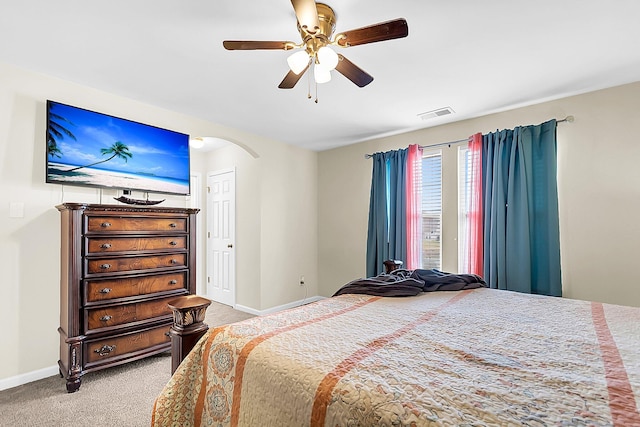 bedroom featuring ceiling fan and light colored carpet