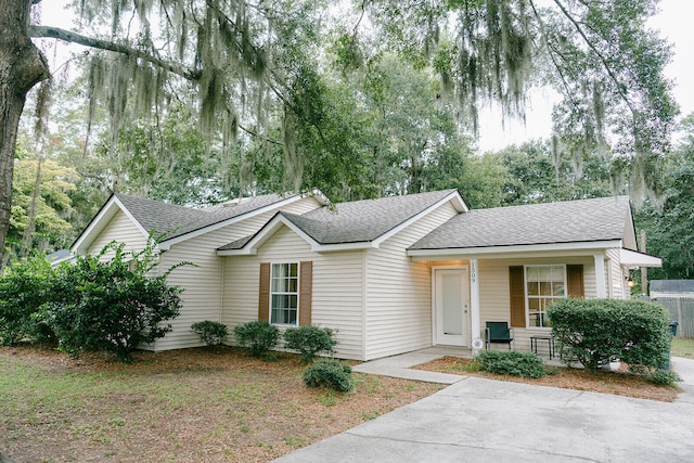 ranch-style house with covered porch