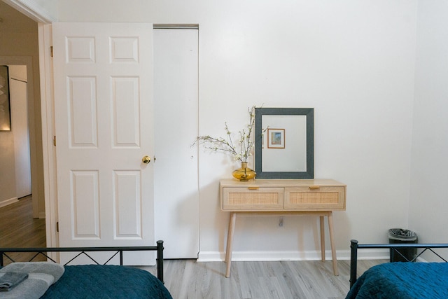 bedroom with light wood-type flooring