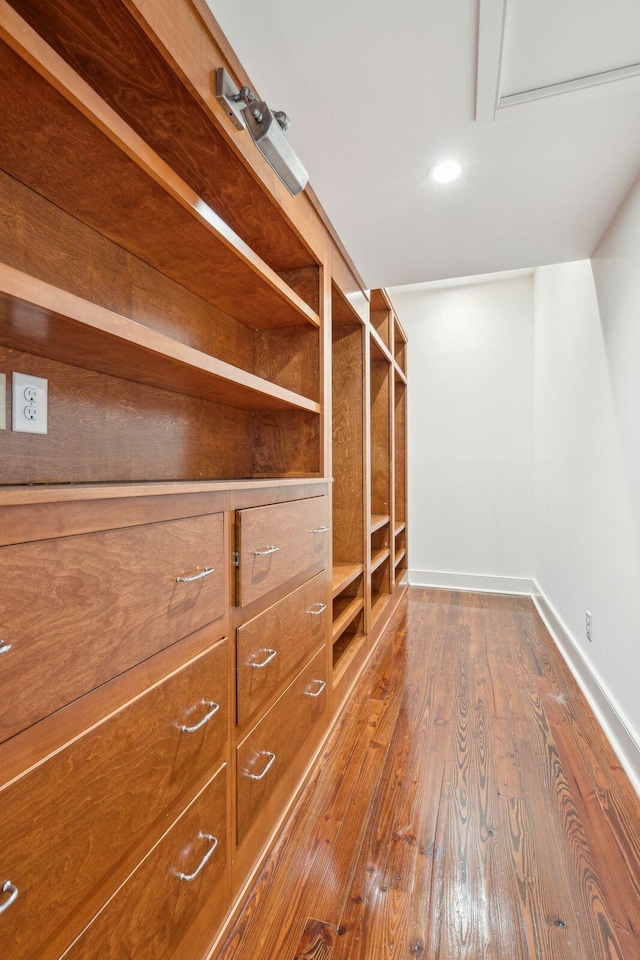 spacious closet featuring wood finished floors