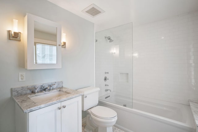 full bath featuring toilet, vanity, bathtub / shower combination, and visible vents