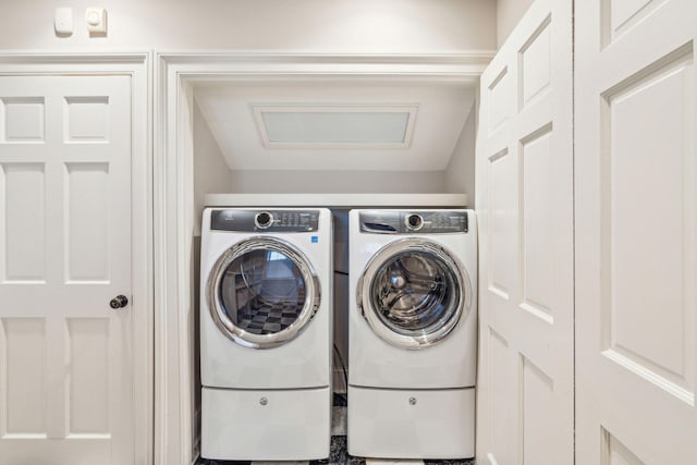 laundry area featuring laundry area and washing machine and clothes dryer