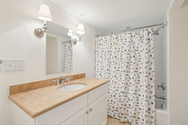 full bath with tile patterned flooring, shower / bath combination with curtain, and vanity