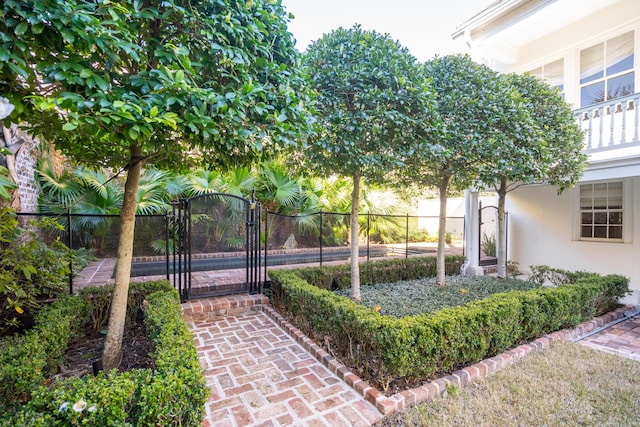 exterior space featuring a gate and fence