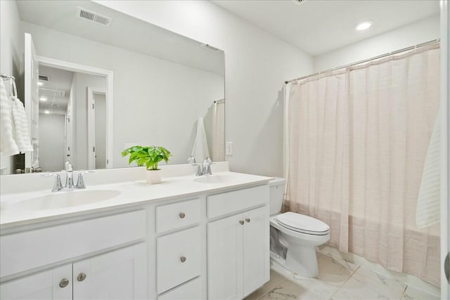 full bathroom with shower / bathtub combination with curtain, vanity, and toilet