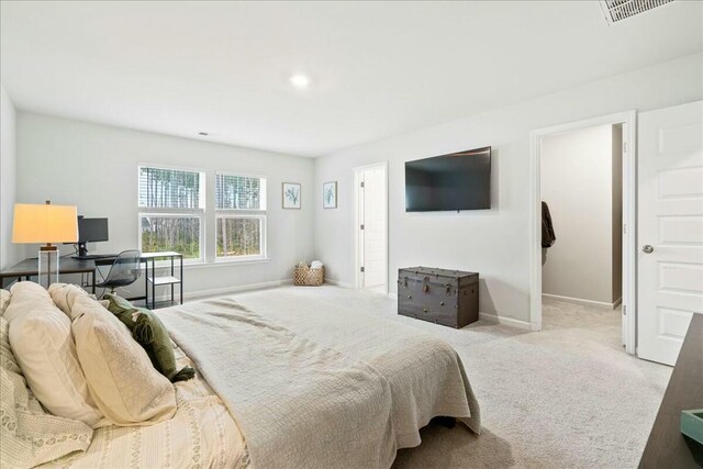 bedroom with light carpet