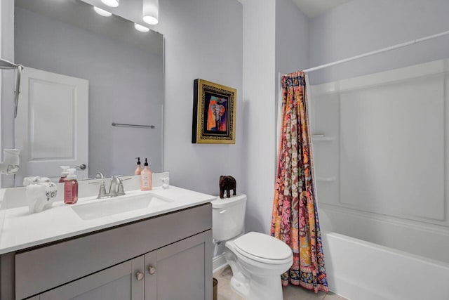 bathroom featuring shower / tub combo with curtain, vanity, and toilet