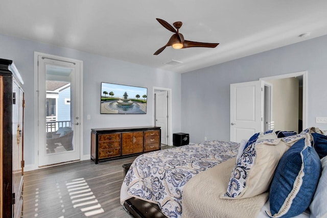 bedroom featuring access to exterior, ceiling fan, baseboards, and wood finished floors