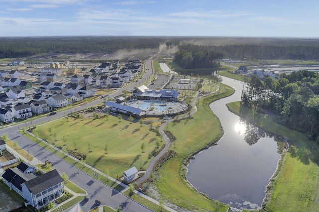 birds eye view of property featuring a residential view and a water view