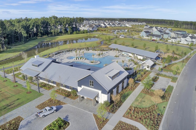 bird's eye view with a residential view and a water view