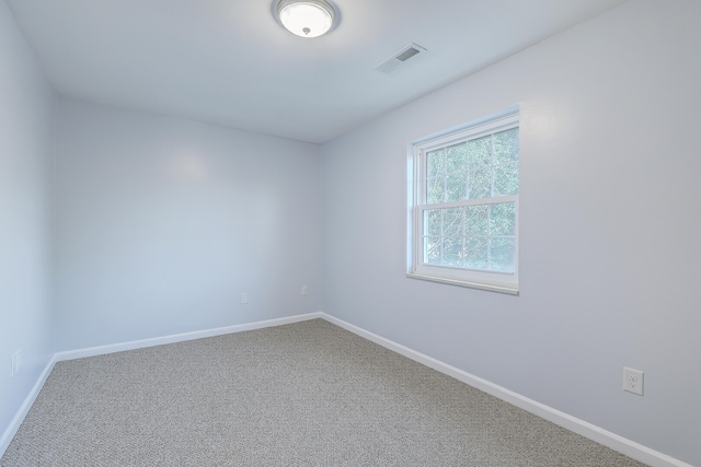 empty room featuring carpet flooring