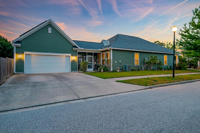1589 Seabago Dr, Charleston, SC 29414 - single story home with concrete driveway, central air condition unit, a garage, and roof with shingles