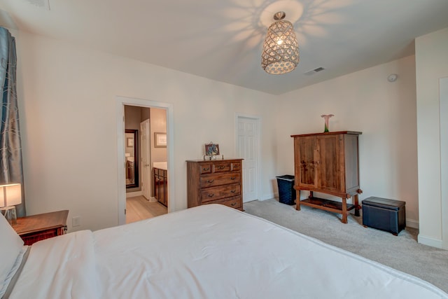 1589 Seabago Dr, Charleston, SC 29414 - bedroom featuring light colored carpet, baseboards, and ensuite bath