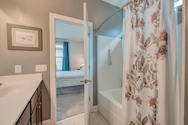 1589 Seabago Dr, Charleston, SC 29414 - ensuite bathroom with shower / bathtub combination with curtain, tile patterned flooring, vanity, and baseboards