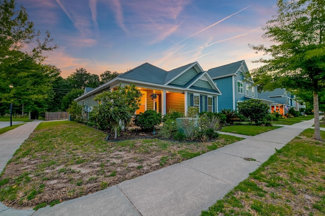 1589 Seabago Dr, Charleston, SC 29414 - view of front of home featuring covered porch and a lawn