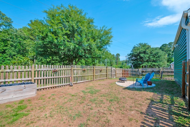 1589 Seabago Dr, Charleston, SC 29414 - fenced backyard with an outdoor fire pit