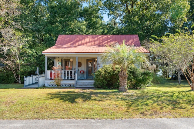 view of front of home with a front lawn and covered porch