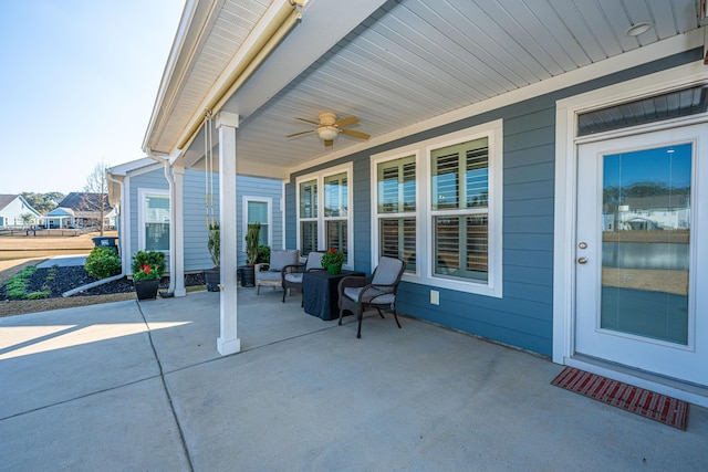 view of patio featuring ceiling fan and covered porch