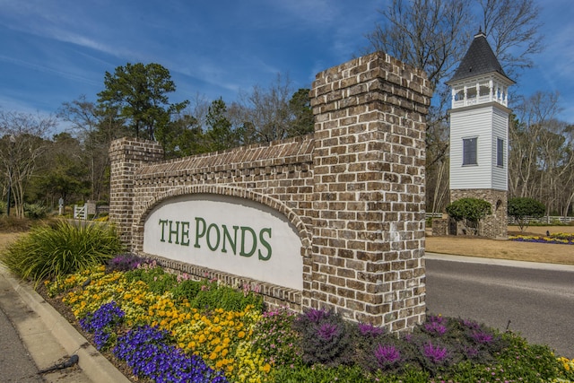 view of community sign