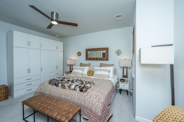 carpeted bedroom with ceiling fan