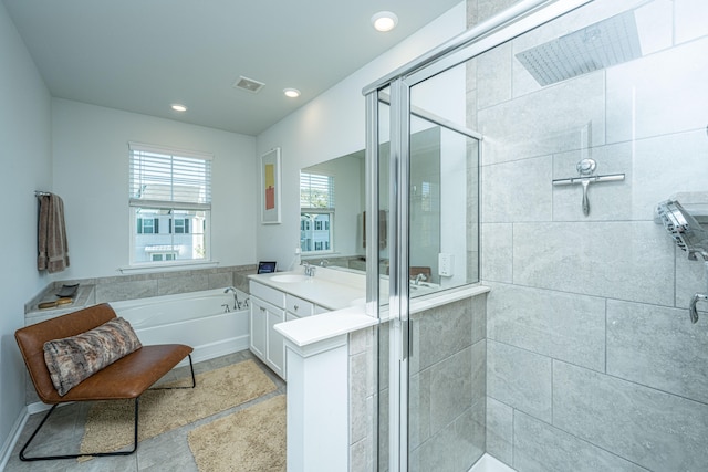 bathroom with vanity and plus walk in shower