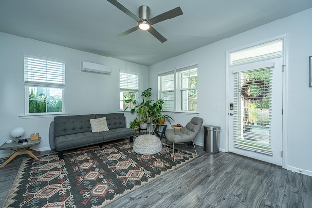 living room featuring dark hardwood / wood-style floors, a wall mounted AC, and ceiling fan