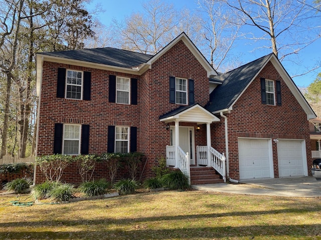 208 Woodland Dr, Summerville, SC 29485 - traditional-style house featuring a garage, driveway, a front lawn, and brick siding