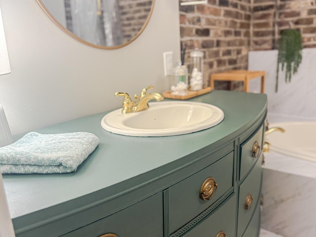 bathroom featuring vanity and a bathtub