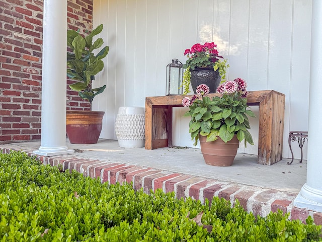 details with decorative columns and board and batten siding