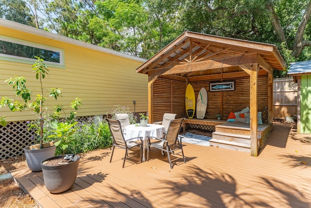 wooden terrace with a gazebo